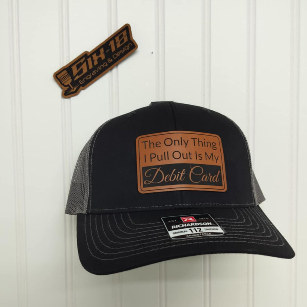 Black cap with brown patch and Funny saying